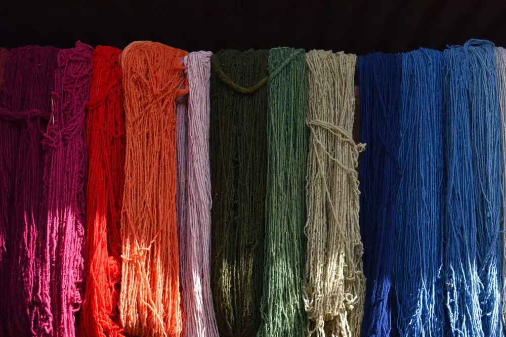 Custom dyed textiles hanging gracefully